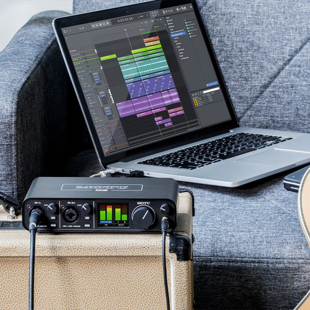 כרטיס קול MOTU M2 – תקריב על שליטה בגיין ומתגי Phantom 